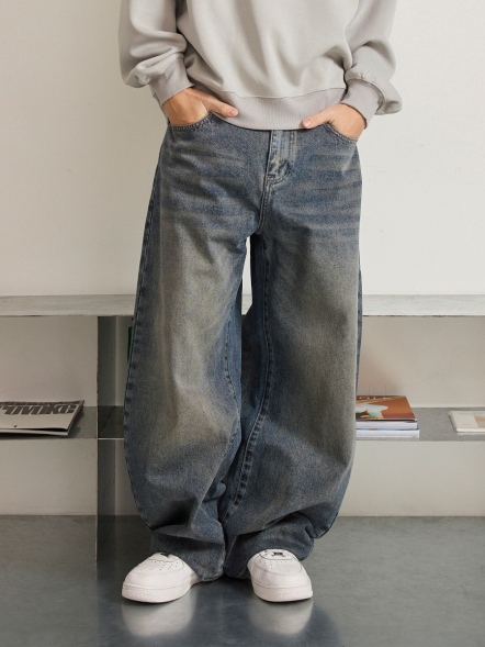 洗舊彎刀寬鬆牛仔長褲